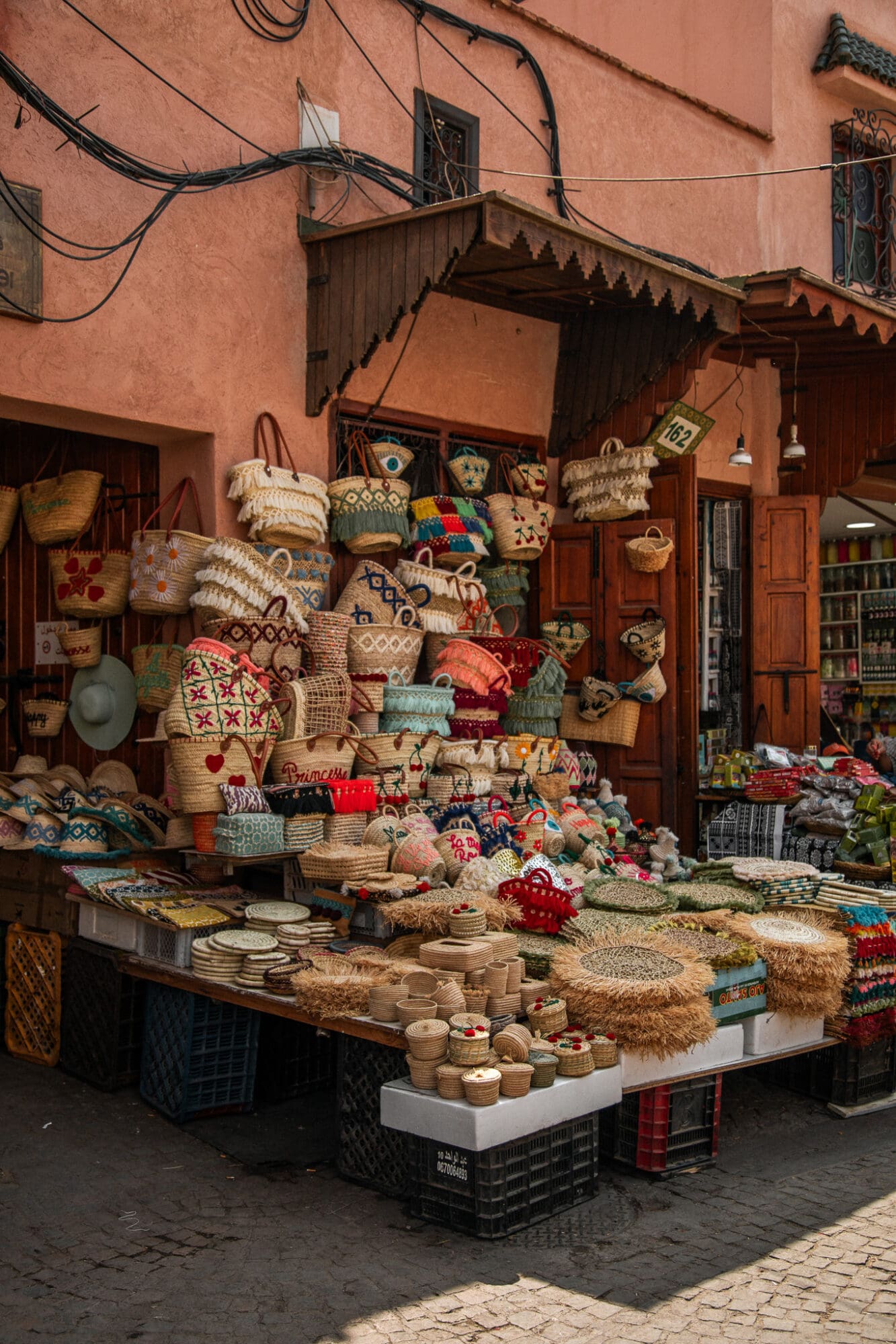 Straw bag shop in the souks, Marrakech Medina, Morocco