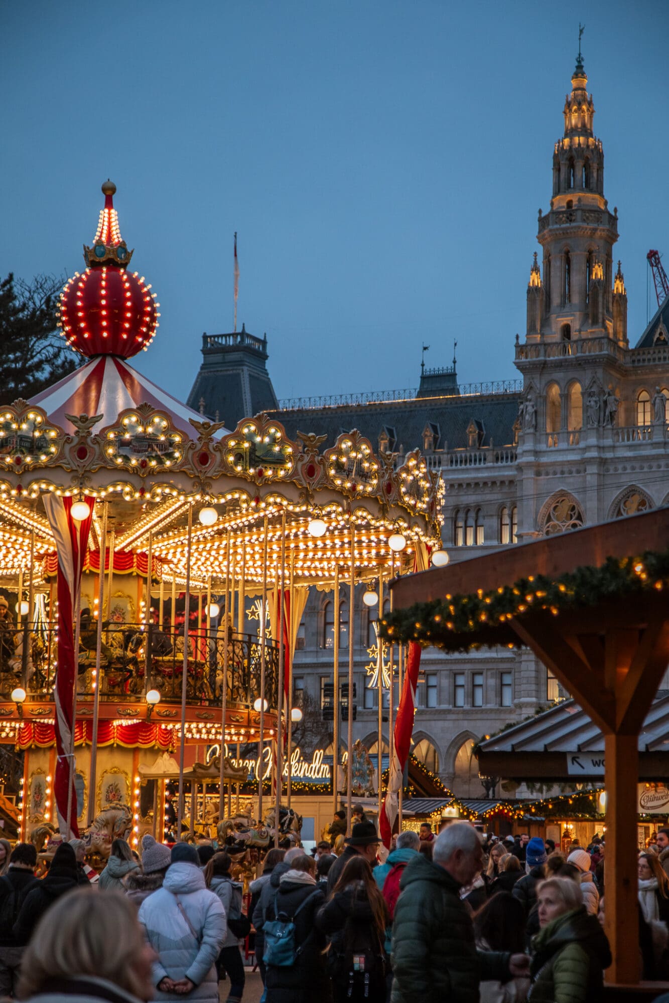 Christkindlmarkt Rathausplatz Vienna christmas market carousel city hall at night