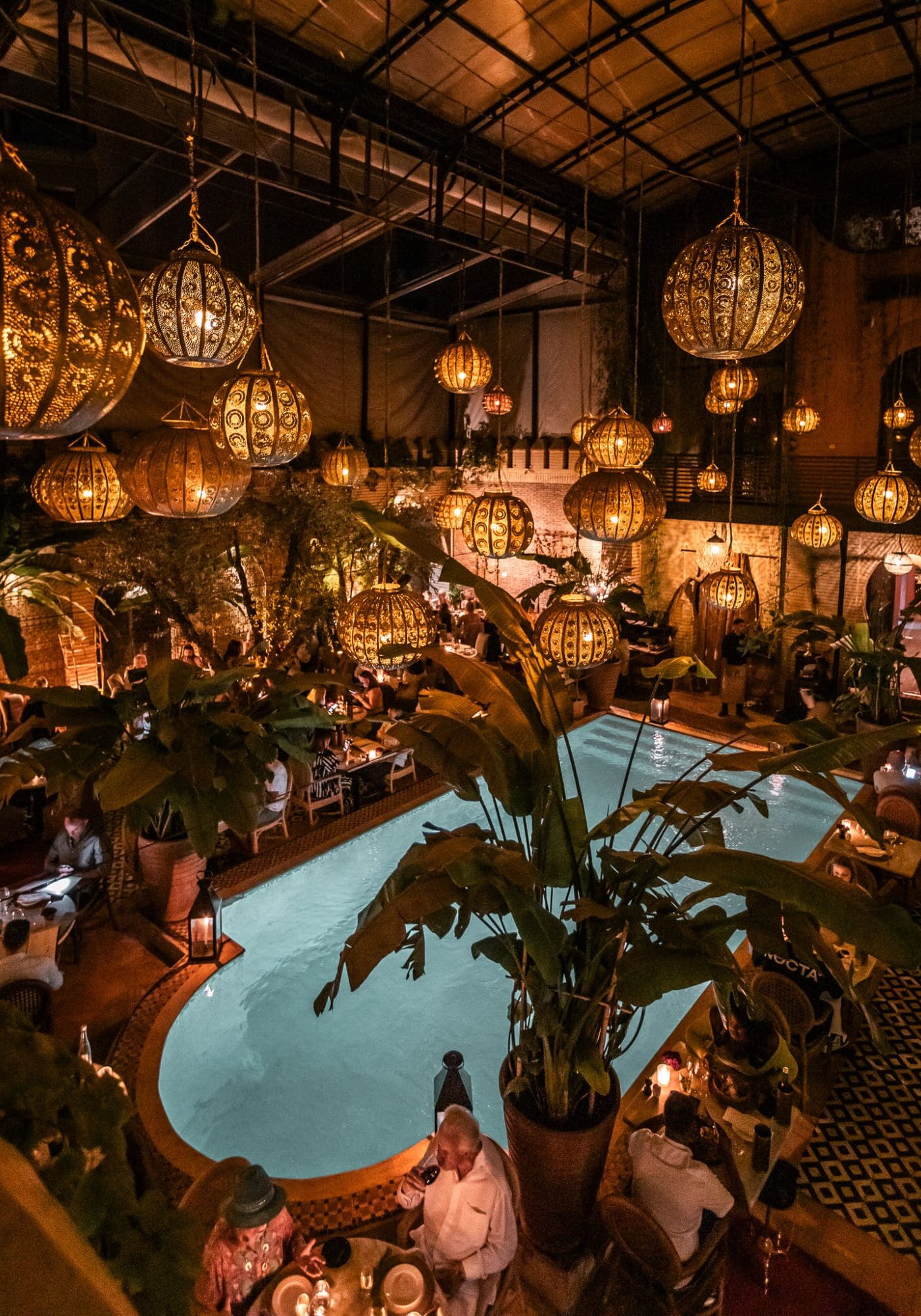 La Trattoria Italian Restaurant Marrakech Morocco Lanterns over the pool Nighttime