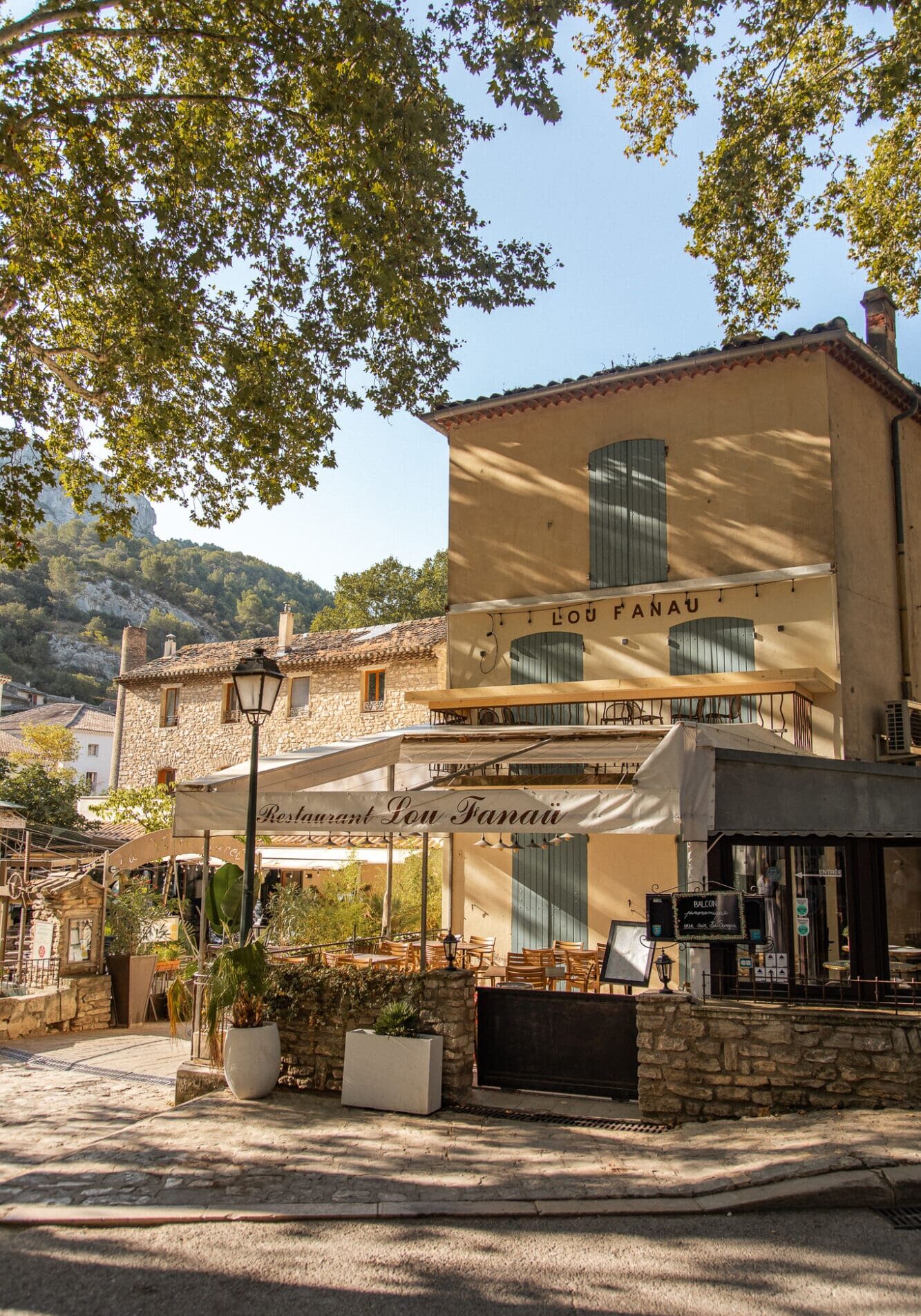 Yellow fronted Cafe in Fontaine-de-Vaucluse Most Beautiful Towns in Provence France Luberon